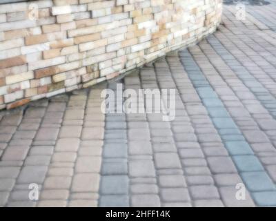 Abstract blurred background decorative paving slabs viewed at a slight angle Stock Photo