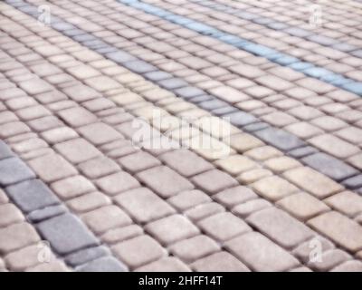 Abstract blurred background decorative paving slabs viewed at a slight angle Stock Photo