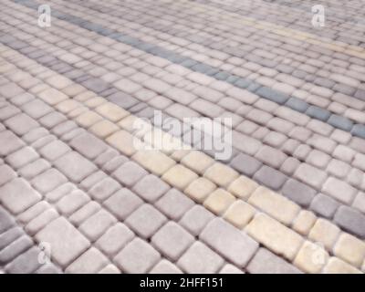 Abstract blurred background decorative paving slabs viewed at a slight angle Stock Photo