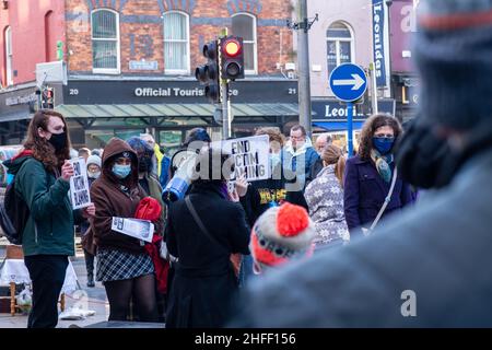 Limerick, Ireland-January, 15, 2022.Meeting of people on Bedford Row street, protected by Garda, Stock Photo