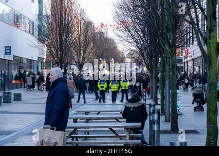 Limerick, Ireland-January, 15, 2022.Meeting of people on Bedford Row street, protected by Garda, Stock Photo