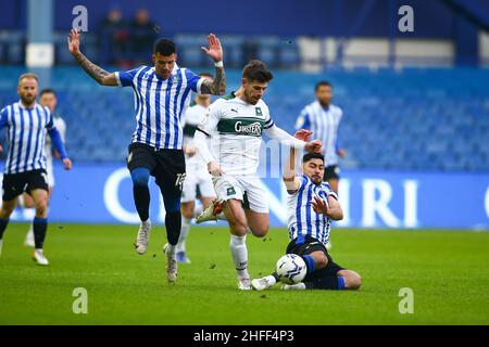 Hillsborough, Sheffield, England -15th January 2022 Massimo Luongo (21) of Sheffield Wednesday with a brilliant tackle to stop the run of Joe Edwards (8) of Plymouth - during the game Sheffield Wednesday v Plymouth Argyle, Sky Bet League One, 2021/22, Hillsborough, Sheffield, England - 15th January 2022  Credit: Arthur Haigh/WhiteRosePhotos/Alamy Live News Stock Photo