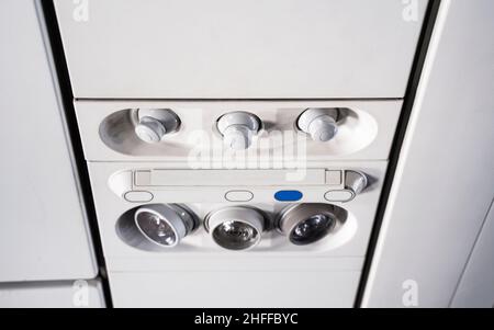Close up of Light and air conditioner switch control panel on the airplane Stock Photo