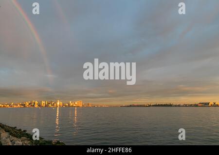 A double rainbow sunset in San Diego, California on Saturday, January 15th, 2022. The city had a tsunami advisory due to the tsunami in Tonga but everything was placid in San Diego Bay (Rishi Deka/Sipa USA). Stock Photo