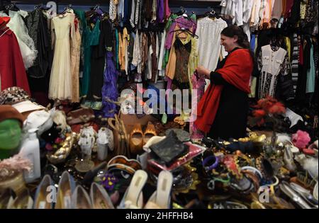 (220116) -- ISTANBUL, Jan. 16, 2022 (Xinhua) -- Ulku Albasmaciyan, owner of By Retro, a second-hand store, works at her store in Istanbul, Turkey, on Jan. 10, 2022. TO GO WITH: 'Feature: Second-hand stores gain popularity in Turkey's Istanbul amid financial woes' (Xinhua/Shadati) Stock Photo