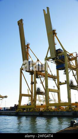 Cranes on a dock in the industrial area of the port of Barcelona, Catalunya, Spain, Europe Stock Photo