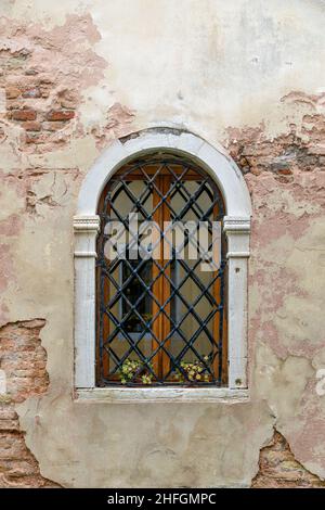 Arched window on the brick wall of an old Anglican Church Stock Photo ...