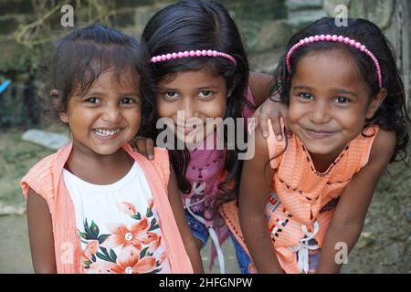 indian cute little sister with lovely smile on face Stock Photo