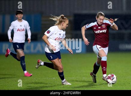 West Ham United's Claudia Walker (right) and Tottenham Hotspur's Molly Bartrip battle for the ball during the Barclays FA Women's Super League match at The Hive, Barnet. Picture date: Sunday January 16, 2022. Stock Photo