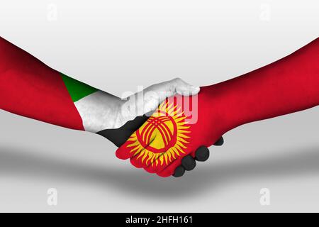 Handshake between kyrgyzstan and united arab emirates flags painted on hands, illustration with clipping path. Stock Photo