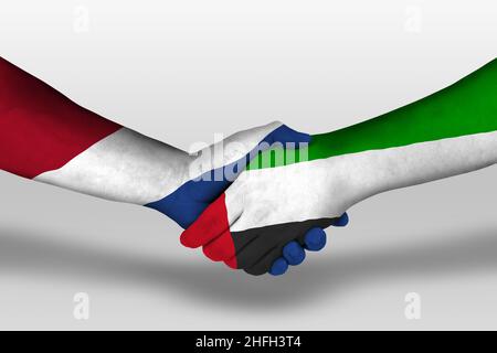 Handshake between united arab emirates and netherlands flags painted on hands, illustration with clipping path. Stock Photo