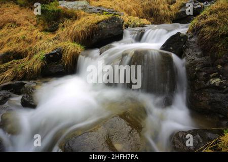 Landscape with waterfall on mountain brook. Take it in Ukrainian Carpathian mountains Stock Photo