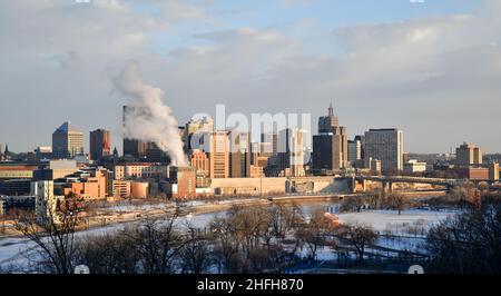 City skyline along the river in cold winter Stock Photo