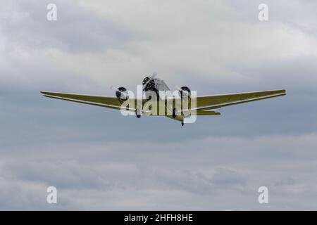 An old three-engine airliner in flight Stock Photo - Alamy