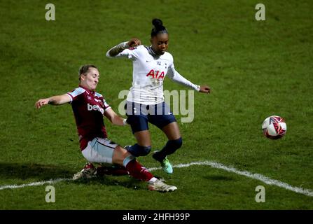 West Ham United's Claudia Walker (left) tackles Tottenham Hotspur's Jessica Naz during the Barclays FA Women's Super League match at The Hive, Barnet. Picture date: Sunday January 16, 2022. Stock Photo