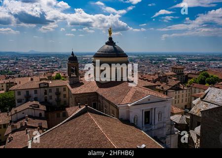 Panoramic aerial view from the tower Campanone with the church Bergamo Cathedral, Duomo di Bergamo, Cattedrale di Sant'Alessandro. Stock Photo