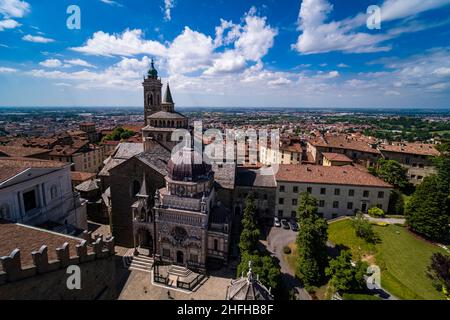 Aerial view from the tower Campanone with the churches Basilica of Santa Maria Maggiore and Colleoni Chapel. Stock Photo