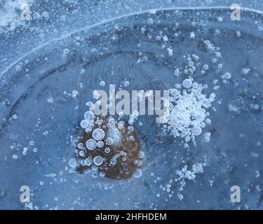 Ice detail, bubbles and leaf frozen in Alava in Winter Stock Photo