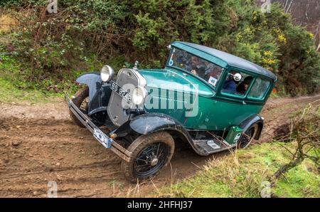 The Vintage model A Ford taking part in the Dave Wilcox Memorial hill trials event in very wet, slippery and muddy conditions. Stock Photo