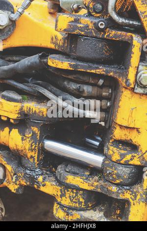 Toned the hydraulic system, high-pressure rubber hoses, shaft power systems unit construction bulldozer, excavator, loader Stock Photo