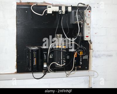 January 2013 - Poor quality electrical installation is an old block of flats and appartments Stock Photo