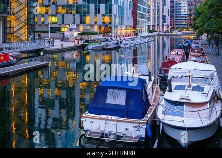 Boats moored in Paddington Basin, London Stock Photo