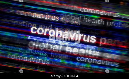 Headline news across international media with coronavirus covid epidemic crisis. Abstract concept of news titles broadcasting on noise displays. TV gl Stock Photo