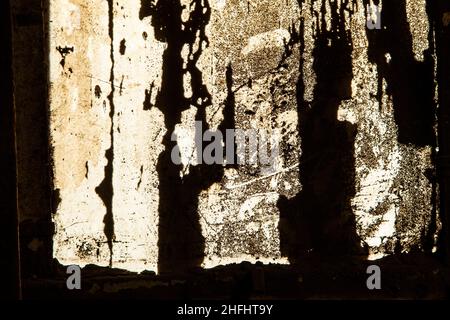 grungy window with carbon black symbolizes the dirt of iron works factories Stock Photo