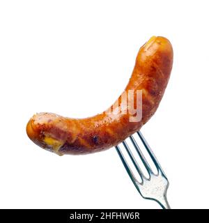 Grilled sausage on fork over white background Stock Photo