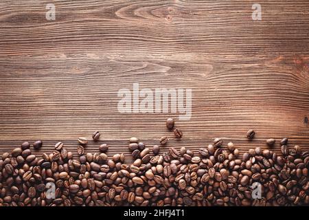 Coffee beans on wooden background Stock Photo