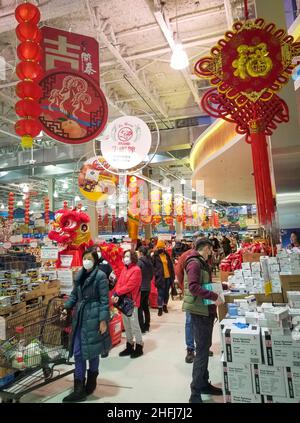 Vancouver, Canada. 16th Jan, 2022. Customers shop for the upcoming Chinese Lunar New Year at a supermarket in Richmond, British Columbia, Canada, Jan. 16, 2022. Credit: Liang Sen/Xinhua/Alamy Live News Stock Photo