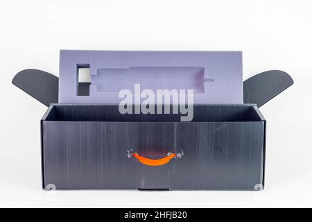 empty open grey boy with orange handle Stock Photo