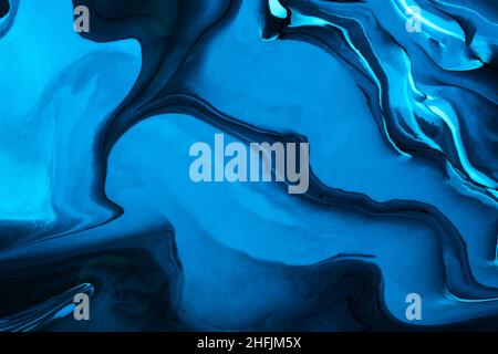 Abstract fluid art background navy blue and black colors. Liquid marble. Acrylic painting on canvas with turquoise gradient and splash. Ink backdrop w Stock Photo
