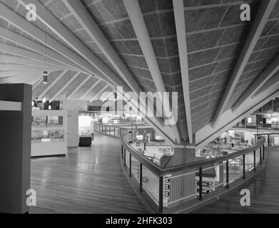 Commonwealth Institute, Kensington High Street, Kensington, London, 30/10/1962. An interior view of the exhibition hall at the Commonwealth Institute showing the corner where two outer roof sections meet and the exposed concrete beams. Laing built the Commonwealth Institute between October 1960 and October 1962 to replace the former Imperial Institute that was to be demolished to make way for new facilities at Imperial College.  The building  consisted of a four-storey administrative block housing a library, restaurant, board room and conference hall and a separate two-storey block containing Stock Photo