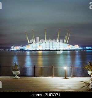 Millennium Dome, Drawdock Road, Greenwich, London, 01/12/1999. An exterior view of the Millennium Dome at night from the north, across the Thames. Stock Photo