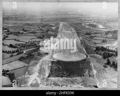 Filton Airfield, South Gloucestershire, 01/09/1947. An aerial view from the west showing the construction of a new runway at Filton Airfield. Laing extended the runway westwards at Filton Airfield to accommodate the Bristol Brabazon airliner, which was being built at the airfield. Work began in July 1946 on the new runway, which was 2,725 yards long and 100 yards wide. The work required the requisitioning and removal of Charlton village and a temporary flying strip was laid, for use while the new runway was under construction. The negative of this print was digitised and catalogued as part of Stock Photo