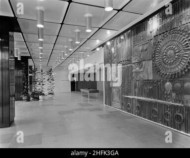 CIS Building, Cooperative Insurance Society Tower, Miller Street, Manchester, 16/10/1962. The main entrance foyer featuring an abstract wall mural in the Co-operative Insurance Society (CIS) Building in Manchester. In 1959, the Laing Company began work on the construction of two office blocks for the Co-operative Society in Manchester. The Co-operative Insurance Society (CIS) tower was over 350ft high when completed in 1962, and was the tallest office block in the country at the time. On an adjacent site, a smaller 14-storey high office block for the Co-operative Wholesale Society (CWS) was co Stock Photo