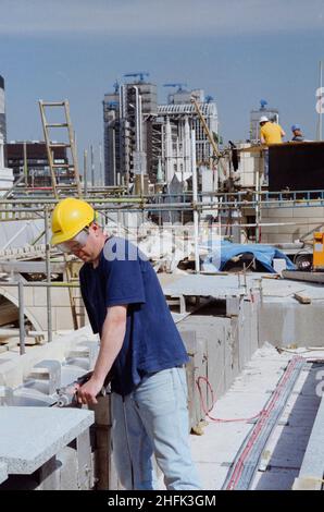 No 1 Poultry, City of London, c1996. A worker drilling into a granite slab during construction of the roof terrace at No. 1 Poultry, London. Photographs from this film were used in the June 1997 issue of Team Spirit, the Laing company newsletter in a review of projects in progress during 1996 and the state of the business. Stock Photo