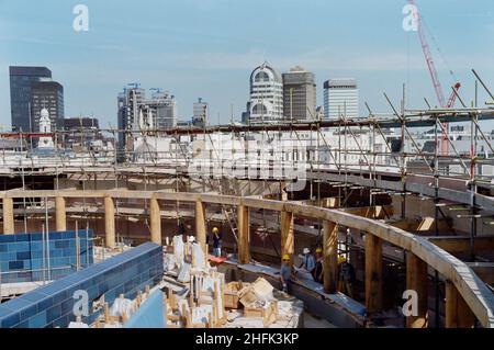 No 1 Poultry, City of London, c1996. The internal timber colonnade of the central circular roof garden during construction at No. 1 Poultry, London.  Showing the rooftops of the buildings to the east beyond. Stock Photo