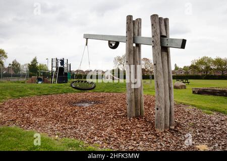 A view looking across the empty children's playground at Norwood Playing Field, during the Covid-19 lockdown. The Picturing Lockdown Collection was created during April and May 2020, in response to the Covid-19 pandemic. During seven days the public were asked to submit photographs that they felt best represented their experiences of lockdown in England, and from these submissions one hundred representing all the different geographic regions were chosen to be archived with Historic England. Alongside these images, ten artists were commissioned to produce their own images over the course of fiv Stock Photo