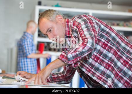 profession al work before blueprint approval for construction business Stock Photo