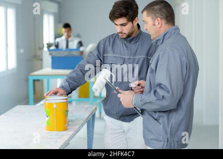 young apprentice painter in professional training Stock Photo