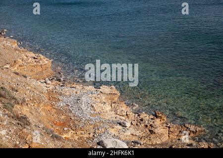 Landscape of silence. Unspoilt, calm seashore. Natural rock structure on the seashore. Stock Photo