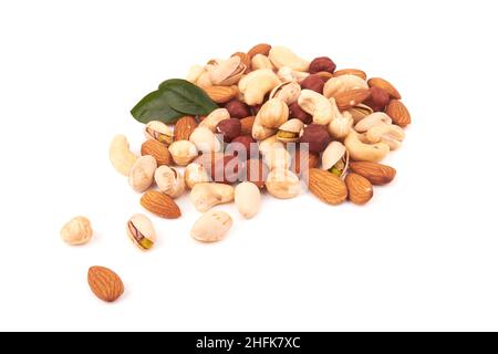 Heap of mixed nuts isolated on white background Stock Photo