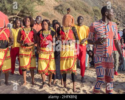 Dakar, Senegal - Feb, 2019: The Kumpo dance on the beach in Dakar. The Kumpo,  Samay, and the Niasse are three traditional figures in the mythology of Stock Photo