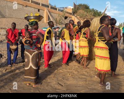 Dakar, Senegal - Feb, 2019: The Kumpo dance on the beach in Dakar. The Kumpo,  Samay, and the Niasse are three traditional figures in the mythology of Stock Photo