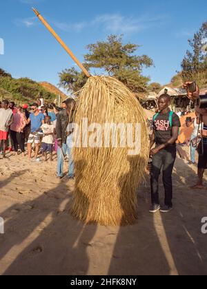 Dakar, Senegal - Feb, 2019: The Kumpo dance on the beach in Dakar. The Kumpo,  Samay, and the Niasse are three traditional figures in the mythology of Stock Photo