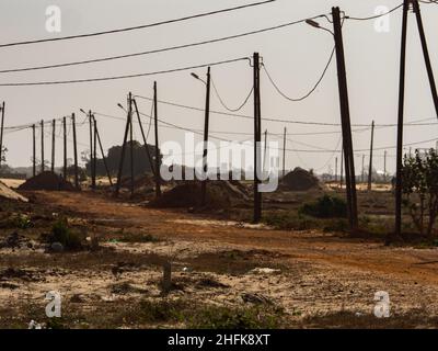 Electric pylons in a field in the suburbs of Dakar, Senegal, Africa. Stock Photo