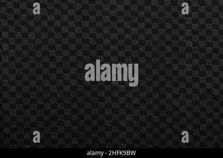 Dark grey melange knitted fabric with checkered ornament textured background Stock Photo