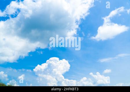 Blue sky with white clouds spreading on a sunny day Stock Photo